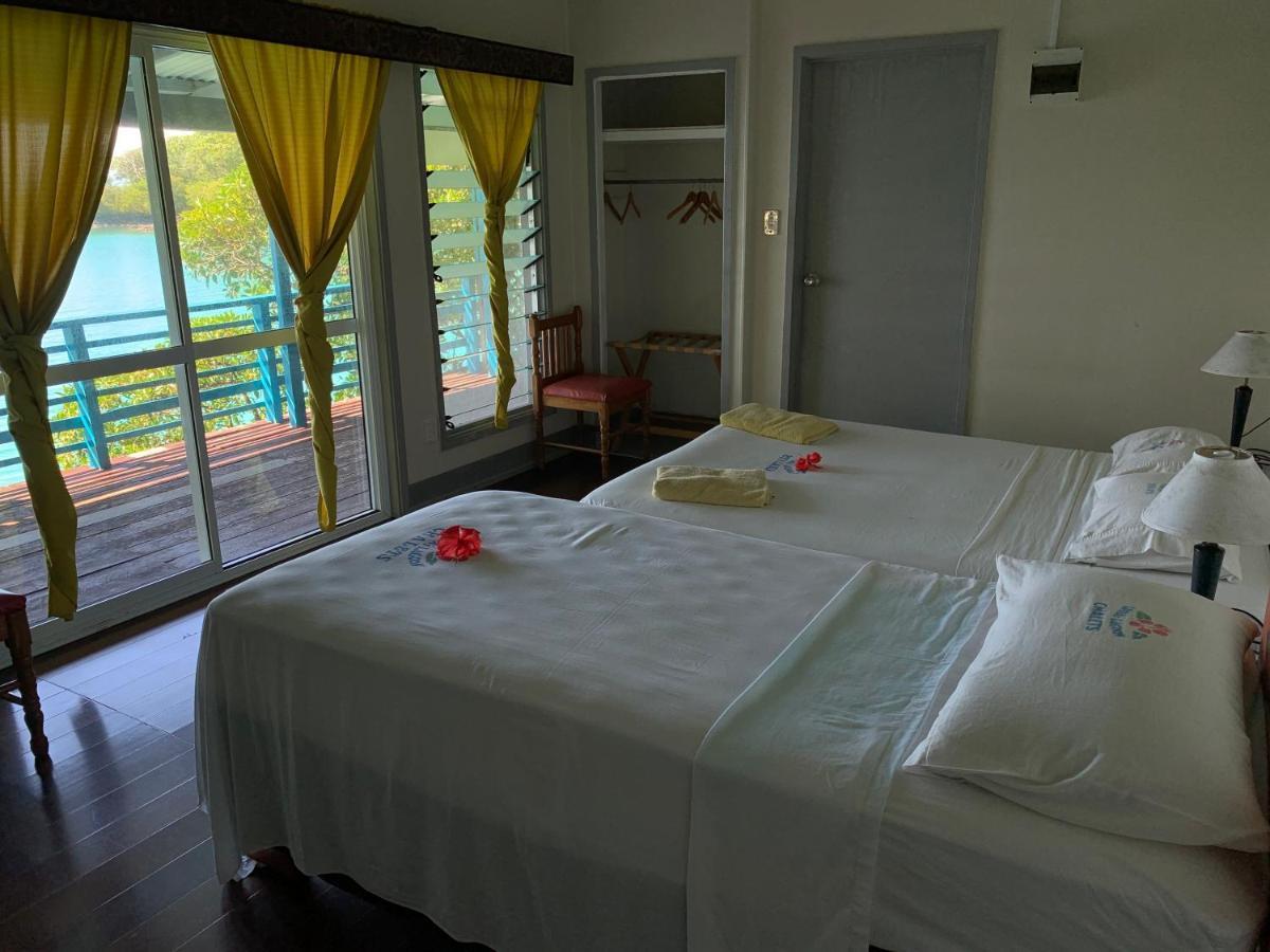 Lusia'S Lagoon Chalets Salelologa Extérieur photo